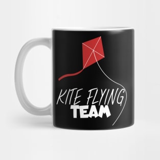 Kite flying team Mug